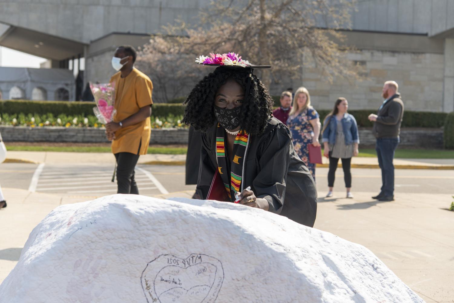 Today, students sign their names on Kissing Rock when they first arrive on campus, and four years later when they graduate.